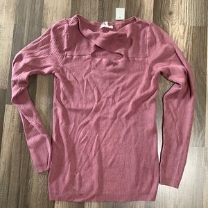 Woman’s cutout sweater